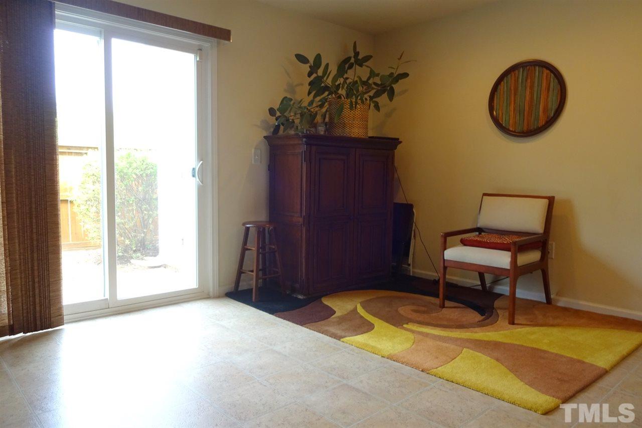 2938 Berkeley Springs Place Raleigh, NC 27616 - Photo 11 of 19 a view of a room with a table and a chair
