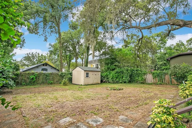 a house with trees in front of it