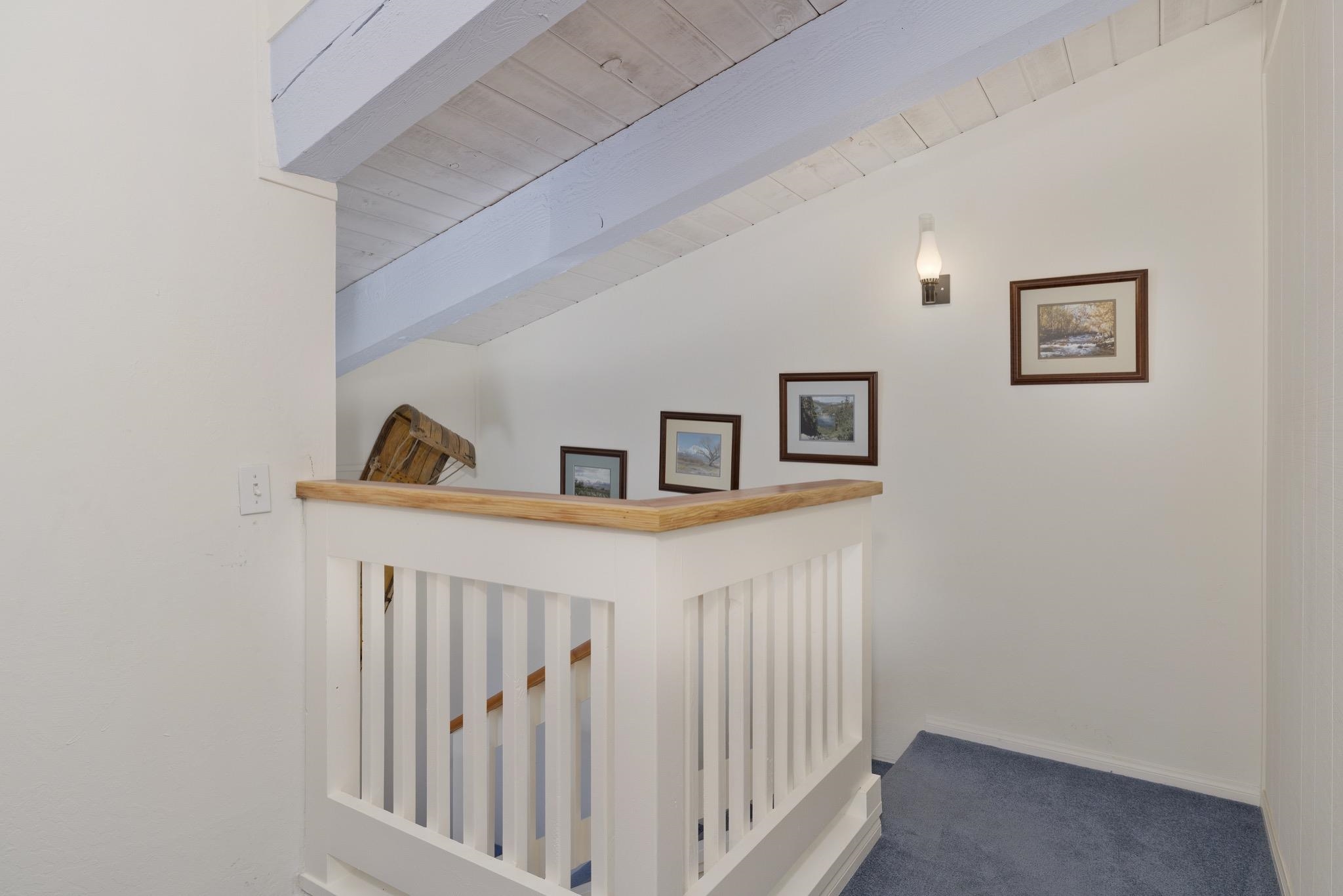 3251-40 Chateau Road, Unit 40 Mammoth Lakes, CA 93546 - Photo 10 of 31 a view of a hallway with a workspace