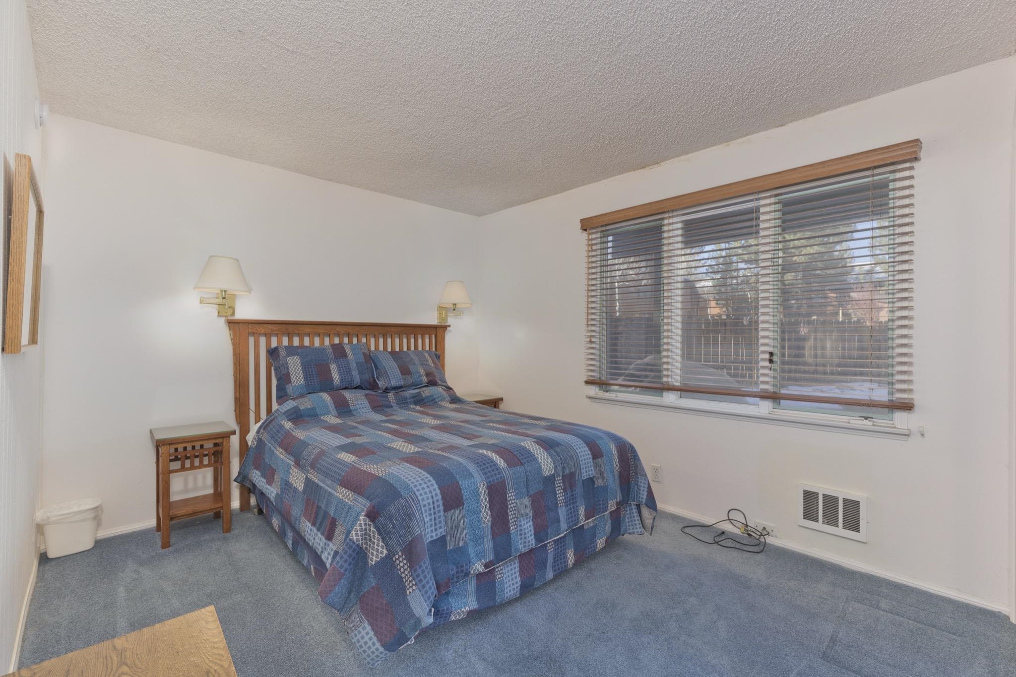 3251-40 Chateau Road, Unit 40 Mammoth Lakes, CA 93546 - Photo 11 of 31 a bedroom with a bed and window