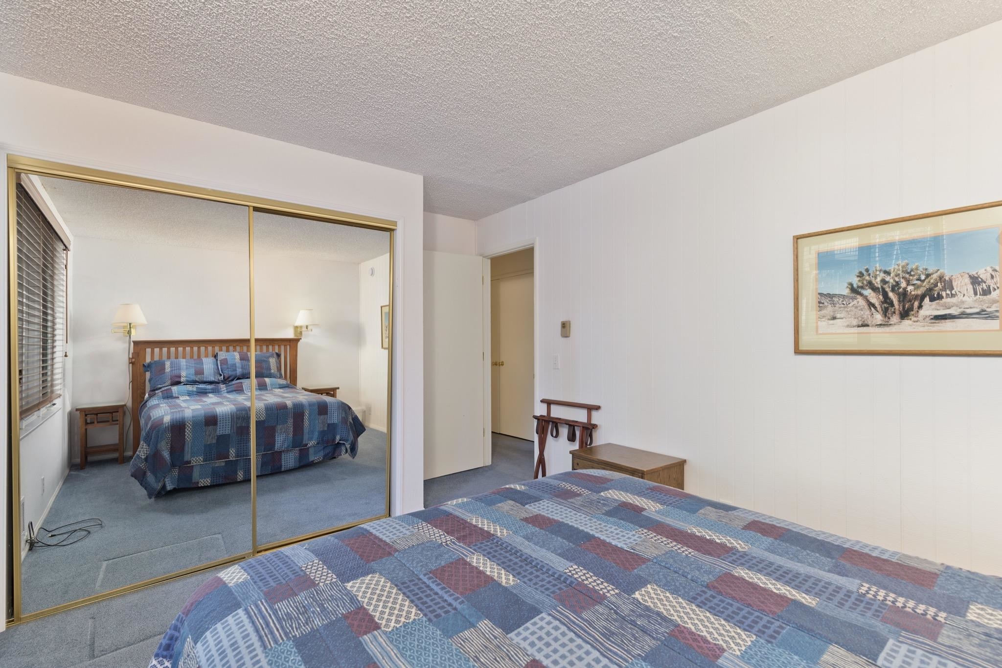 3251-40 Chateau Road, Unit 40 Mammoth Lakes, CA 93546 - Photo 13 of 31 a bedroom with a bed and a cabinets