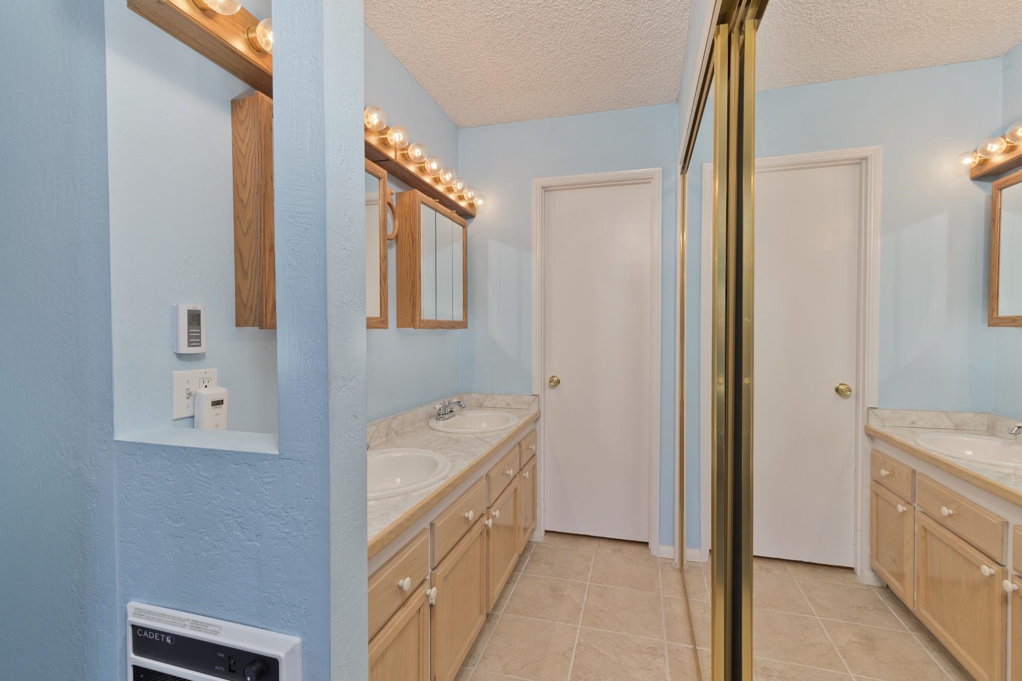 3251-40 Chateau Road, Unit 40 Mammoth Lakes, CA 93546 - Photo 17 of 31 a utility room with cabinets washer and dryer