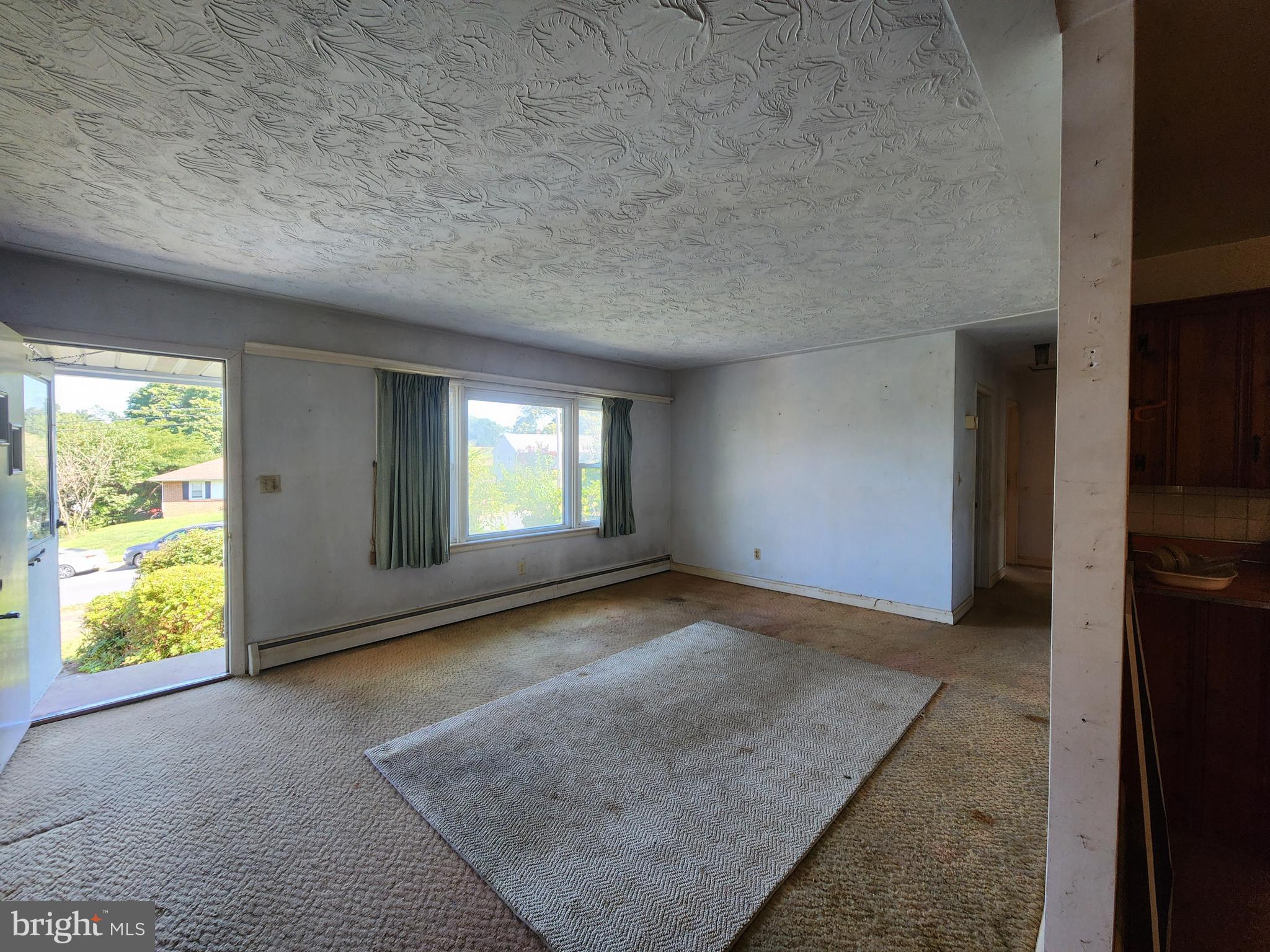 404 West Pearl Street Rising Sun, MD 21911 - Photo 2 of 7 an empty room with windows