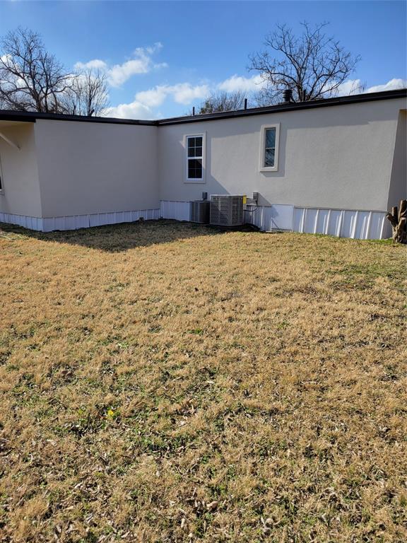 145 Lakeview Road Roanoke, TX 76262 - Photo 5 of 6 rear of property showing addition