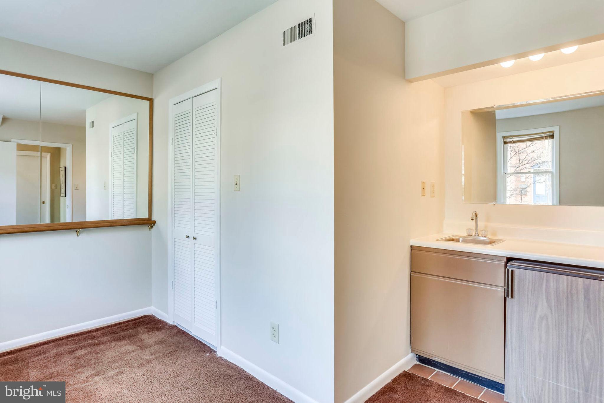 2102 Military Road Arlington, VA 22207 - Photo 6 of 40 Den with wet bar and sauna
