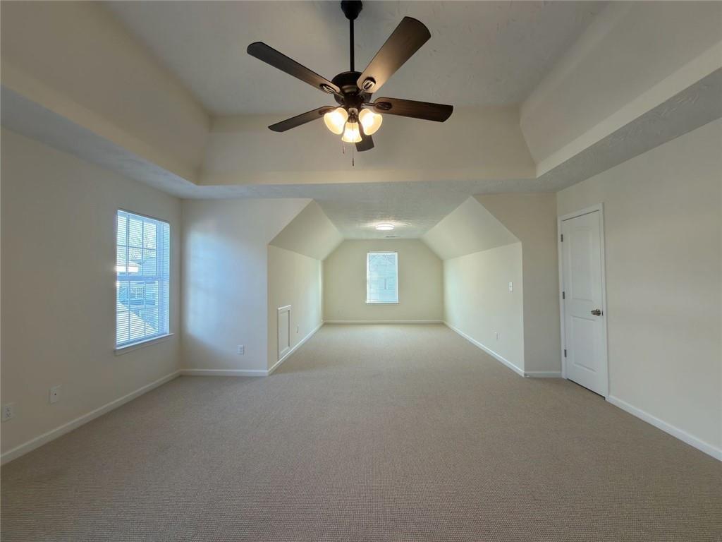 2770 Austin Ridge Drive Northeast Dacula, GA 30019 - Photo 31 of 51 a view of an empty room with a window