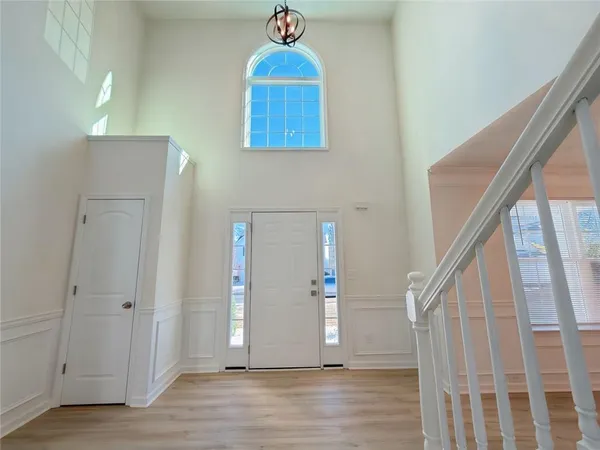 a view of entryway with wooden floor