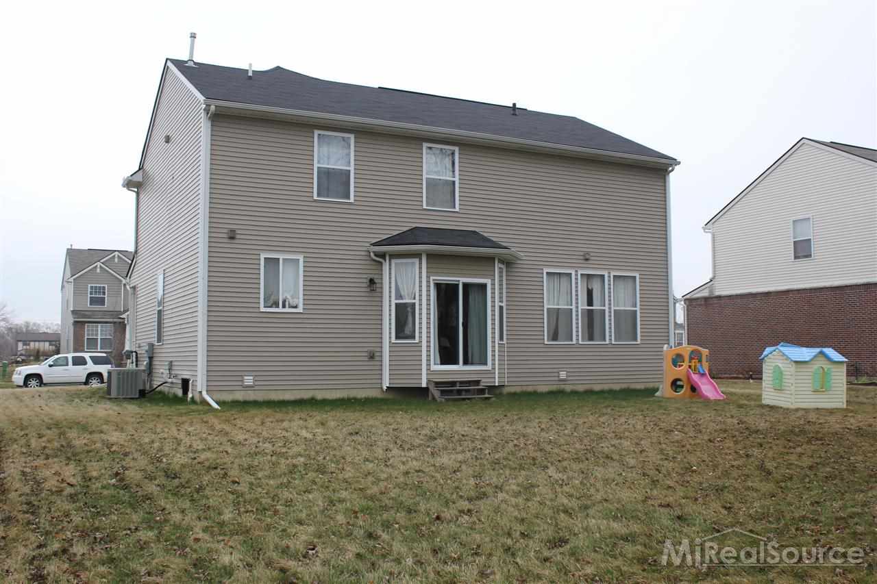 47915 Gloede Road Macomb, MI 48044 - Photo 25 of 29 Exterior rear