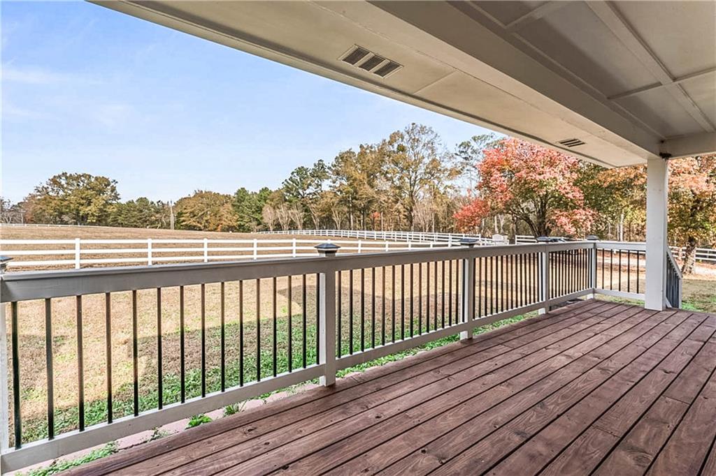 2670 Old Jackson Road Locust Grove, GA 30248 - Photo 8 of 30 a view of balcony with wooden floor