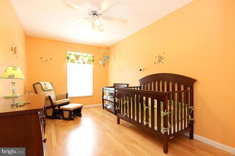 1840 Middlebridge Drive Silver Spring, MD 20906 - Photo 13 of 25 a view of a bedroom with a lounge chair