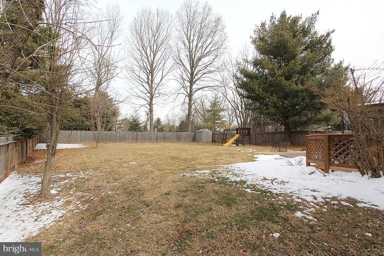 1840 Middlebridge Drive Silver Spring, MD 20906 - Photo 25 of 25 a view of a yard covered with snow