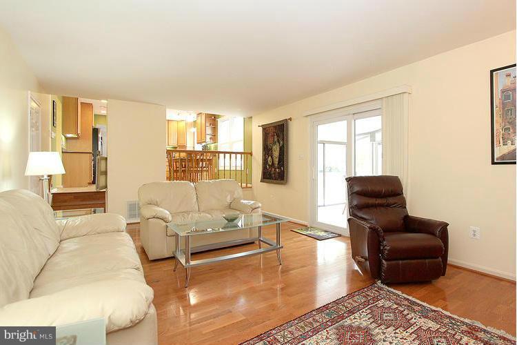 1840 Middlebridge Drive Silver Spring, MD 20906 - Photo 9 of 25 a living room with furniture rug and window