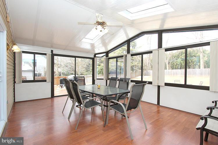 1840 Middlebridge Drive Silver Spring, MD 20906 - Photo 10 of 25 a view of a dining room with furniture window and wooden floor
