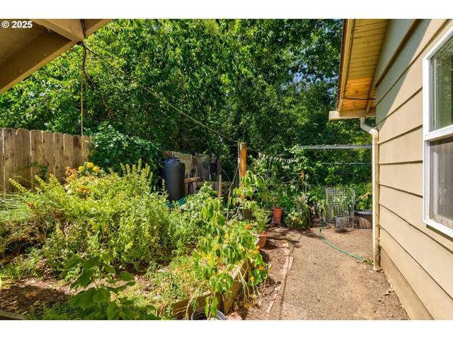 an aerial view of residential house with outdoor space