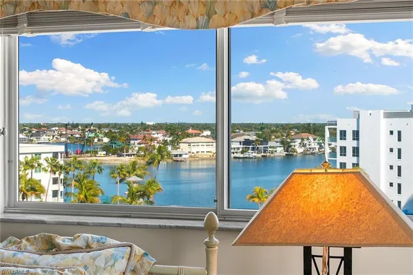 a view of swimming pool from a balcony
