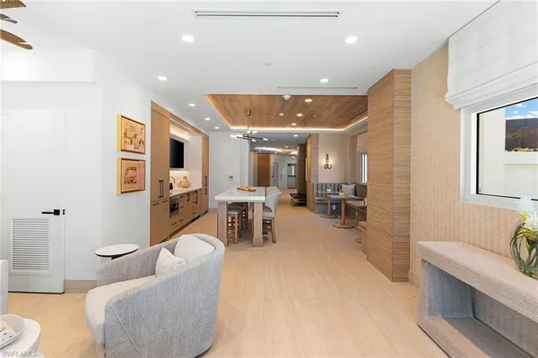 a living room with furniture and a table