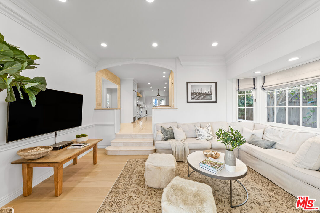31202 Broad Beach Road Malibu, CA 90265 - Photo 11 of 38 a living room with furniture and a flat screen tv