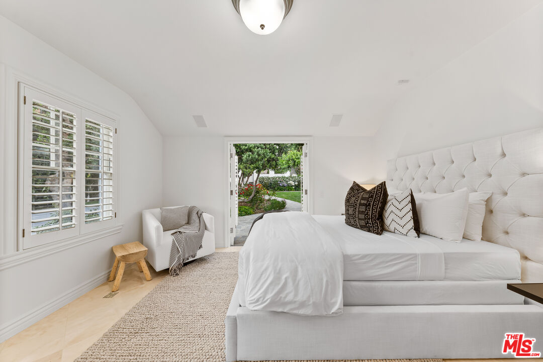 31202 Broad Beach Road Malibu, CA 90265 - Photo 20 of 38 a large white bed in a white room