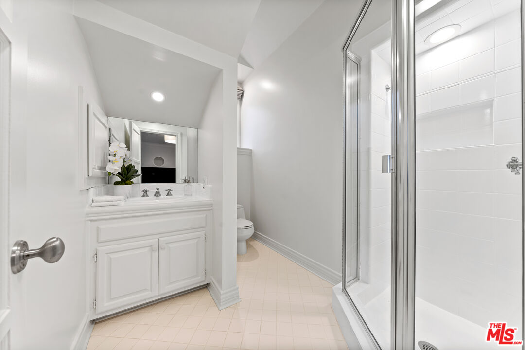 31202 Broad Beach Road Malibu, CA 90265 - Photo 25 of 38 a bathroom with a sink and a mirror