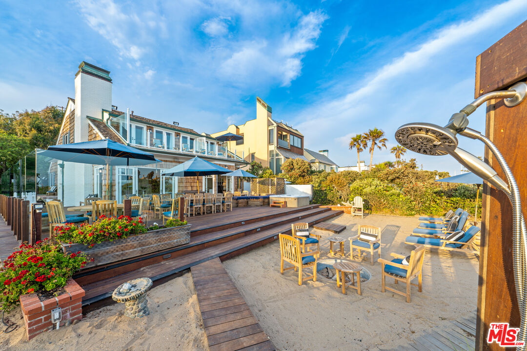 31202 Broad Beach Road Malibu, CA 90265 - Photo 28 of 38 a front view of a house with outdoor seating