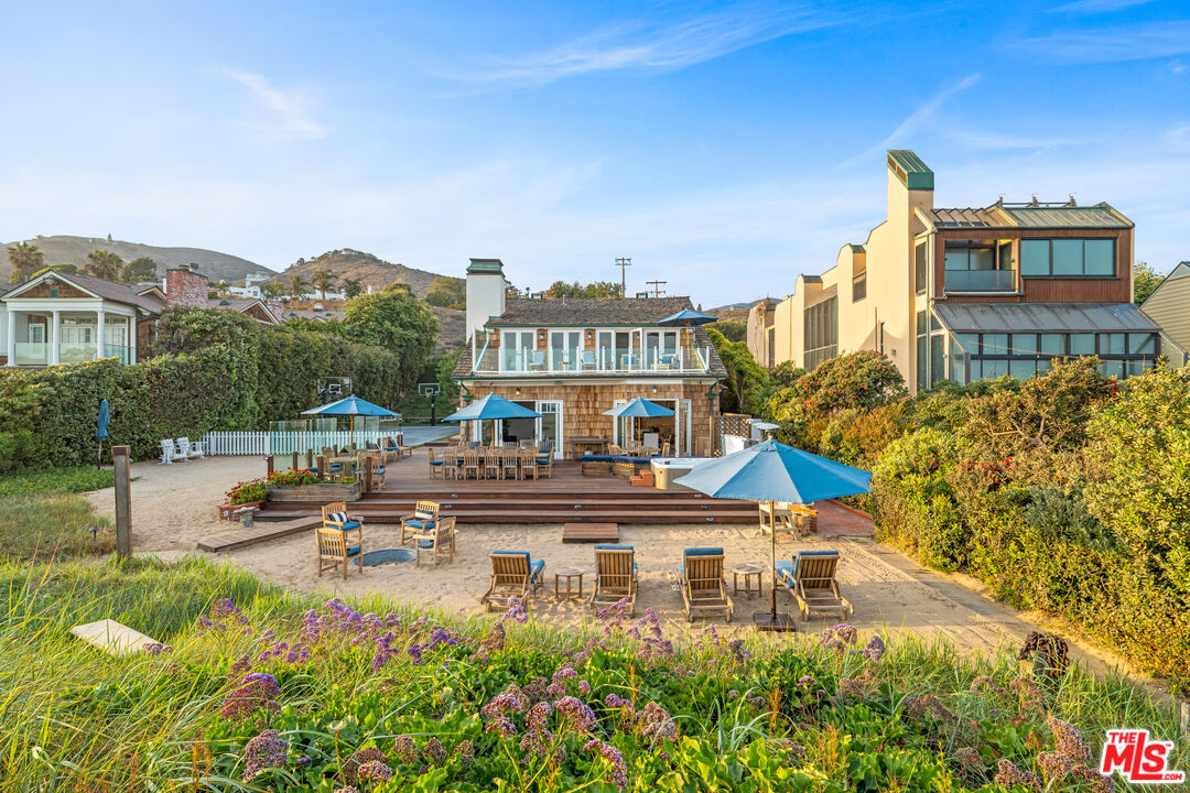 31202 Broad Beach Road Malibu, CA 90265 - Photo 3 of 38 a house view with a garden space
