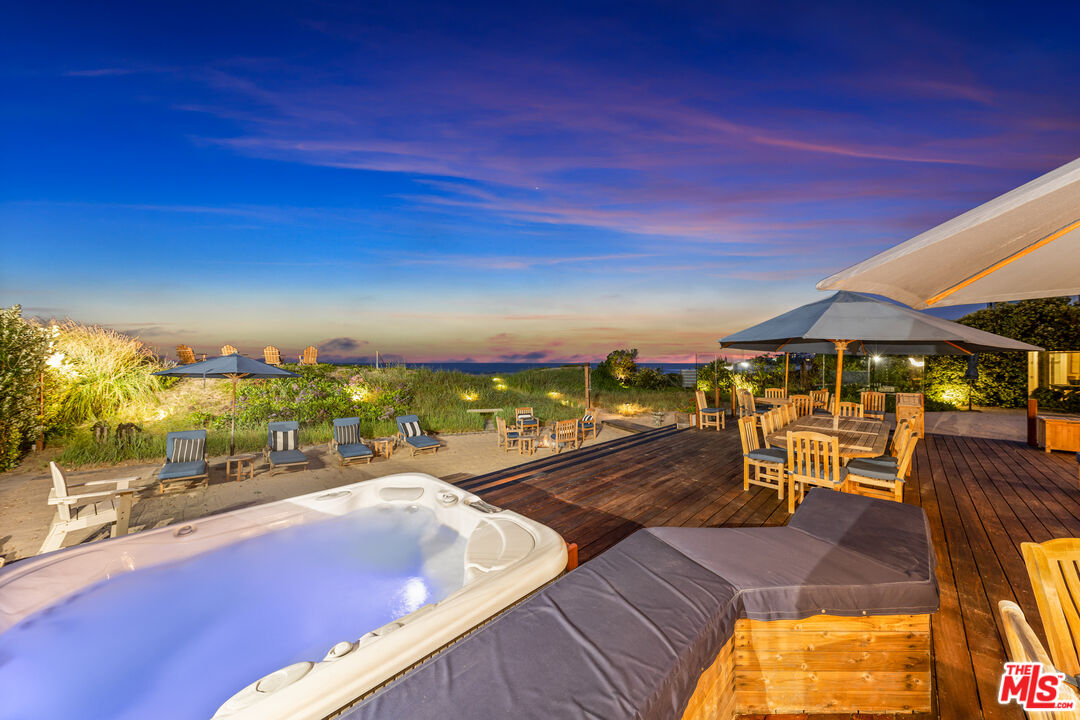 31202 Broad Beach Road Malibu, CA 90265 - Photo 34 of 38 a view of a swimming pool with a patio