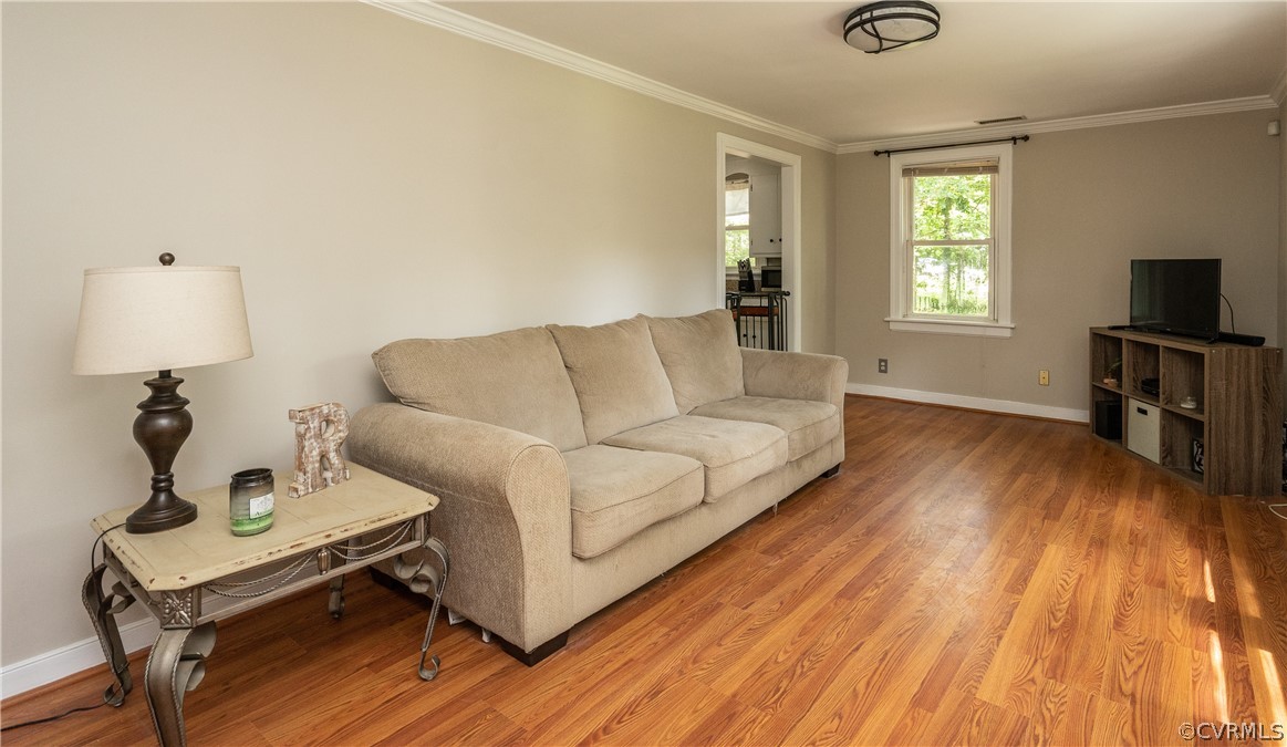 4100 Baldwin Road Chester, VA 23831 - Photo 6 of 26 a living room with furniture and a wooden floor