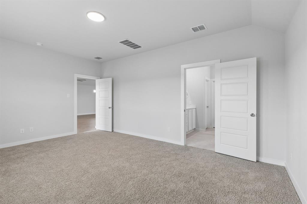 1428 Companero Street Haslet, TX 76052 - Photo 16 of 33 Primary Suite in the Oscar home plan by Trophy Signature Homes – REPRESENTATIVE PHOTO