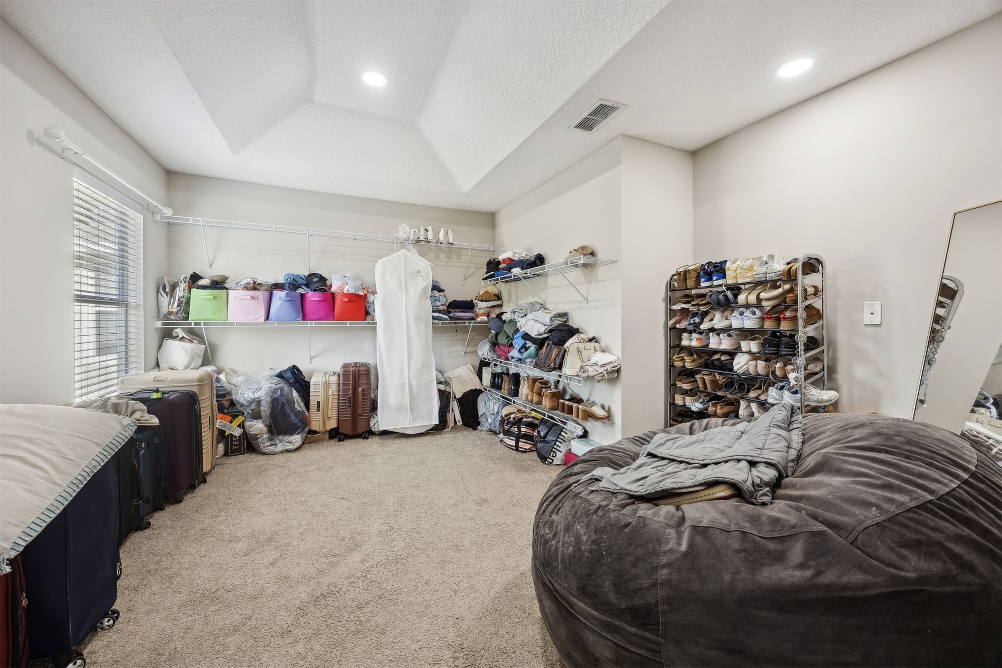 86126 Remsenburg Drive Fernandina Beach, FL 32034 - Photo 18 of 35 a bedroom with bed and a large window