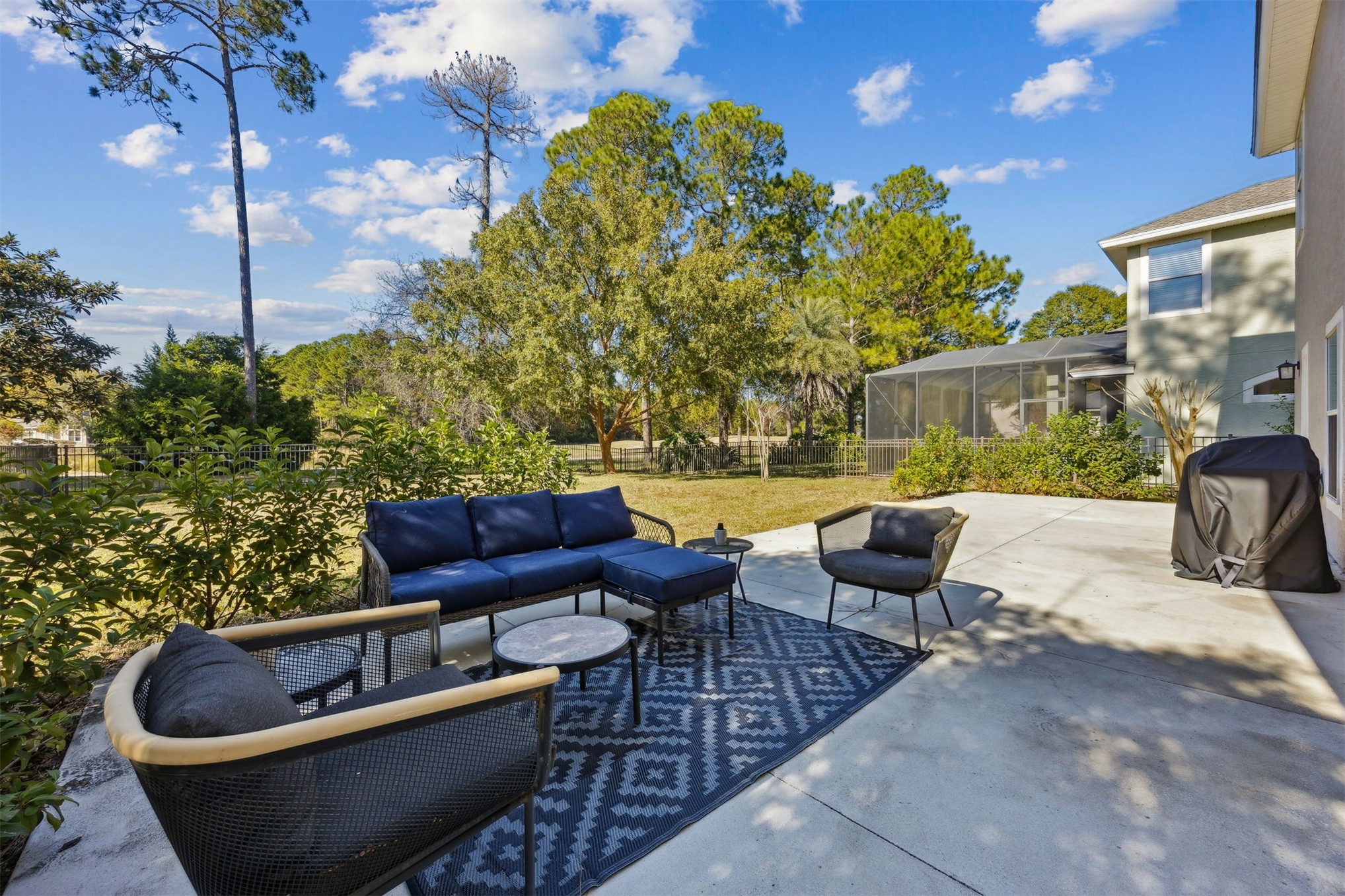 86126 Remsenburg Drive Fernandina Beach, FL 32034 - Photo 24 of 35 a balcony with outdoor seating and plants
