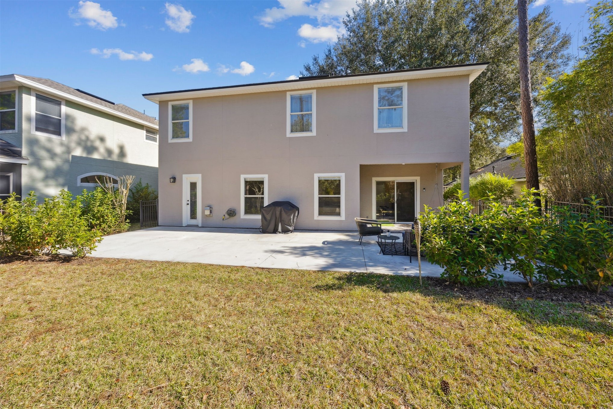 86126 Remsenburg Drive Fernandina Beach, FL 32034 - Photo 27 of 35 a view of a house with swimming pool and sitting area