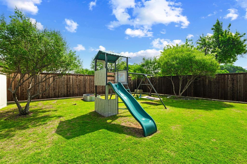 224 Overcrest Drive Benbrook, TX 76126 - Photo 34 of 39 a garden with a wooden fence