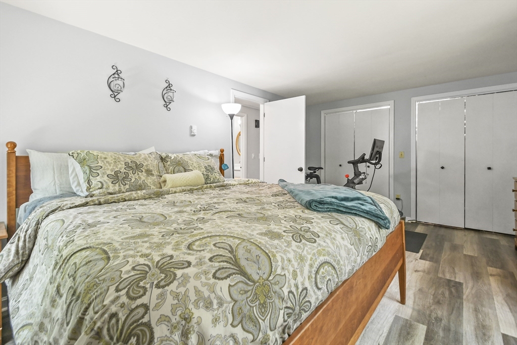 231 Georgetown Road Boxford, MA 01921 - Photo 13 of 28 a bedroom with a bed and a night stand