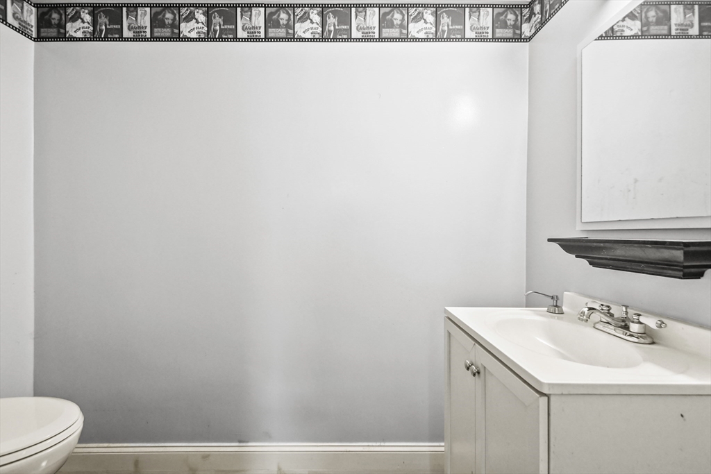 231 Georgetown Road Boxford, MA 01921 - Photo 20 of 28 a bathroom with a sink and a toilet