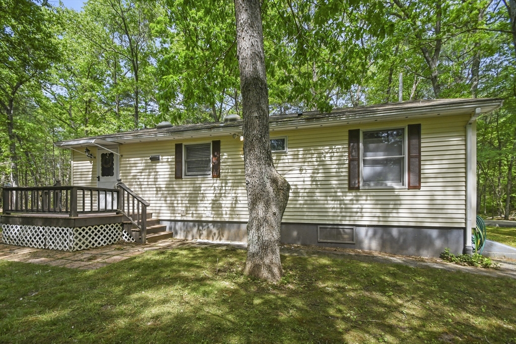 231 Georgetown Road Boxford, MA 01921 - Photo 22 of 28 a front view of a house with a yard