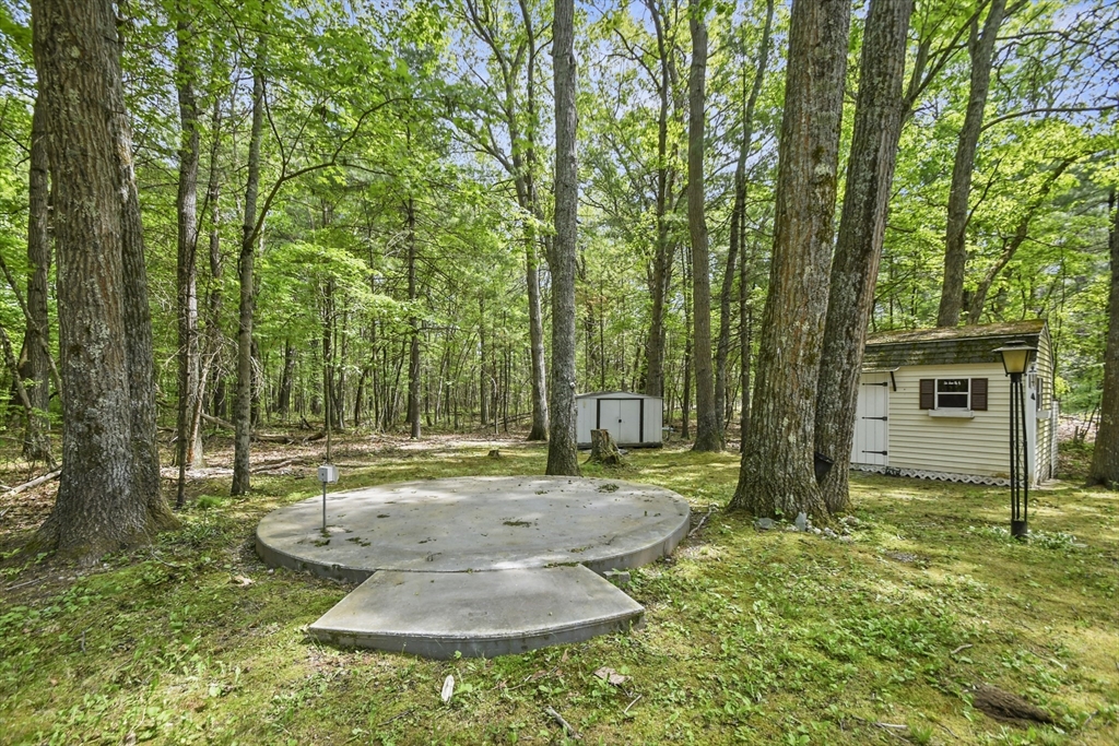 231 Georgetown Road Boxford, MA 01921 - Photo 24 of 28 a view of a backyard with large trees