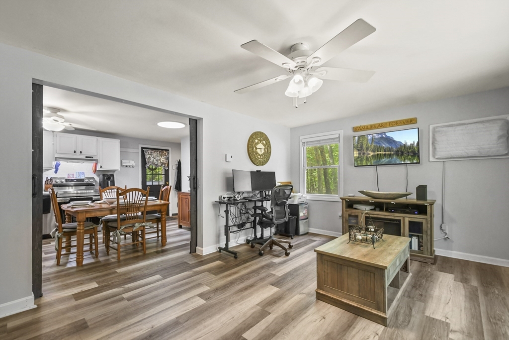 231 Georgetown Road Boxford, MA 01921 - Photo 3 of 28 a living room with furniture and wooden floor