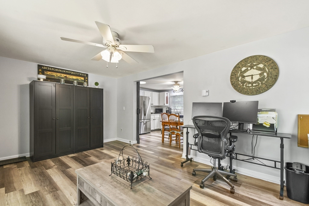 231 Georgetown Road Boxford, MA 01921 - Photo 5 of 28 a workspace with furniture and chandelier