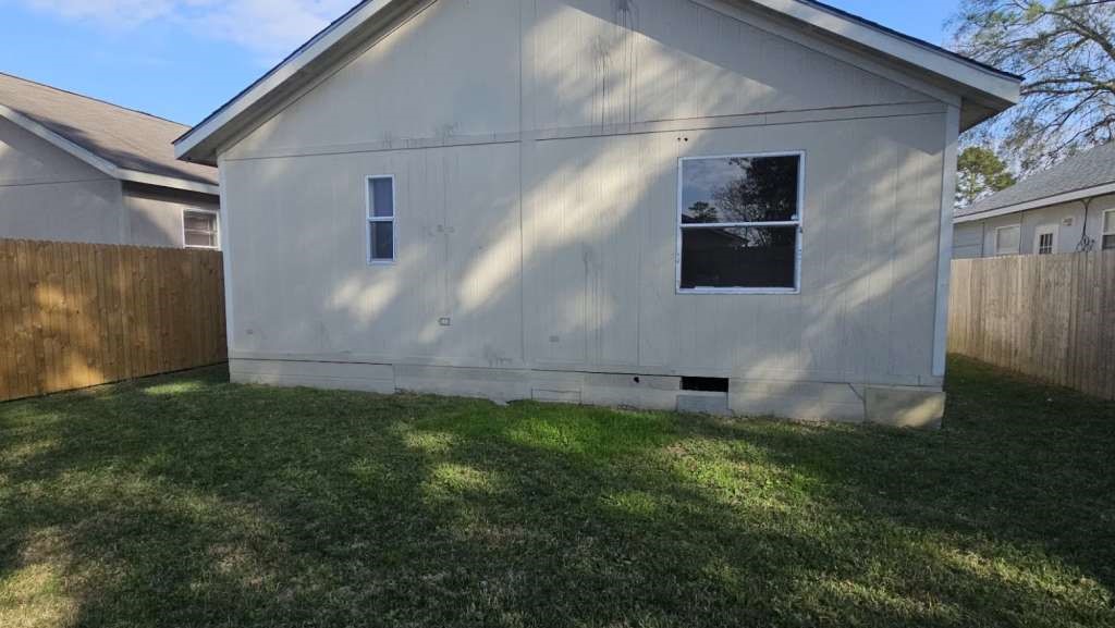 11919 Kingslake Forest Drive Houston, TX 77044 - Photo 11 of 11 a view of a backyard of the house