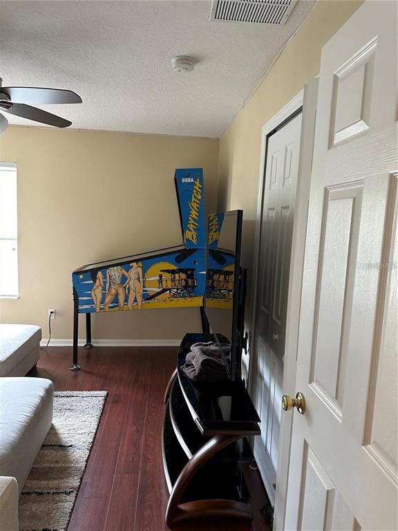 16307 Old Ash Loop Orlando, FL 32828 - Photo 24 of 26 a view of a living room with furniture and wooden floor
