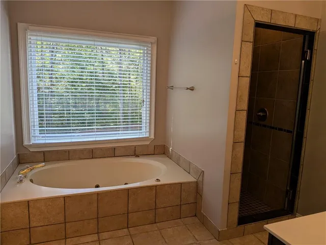 a potted plant sitting in front of a house