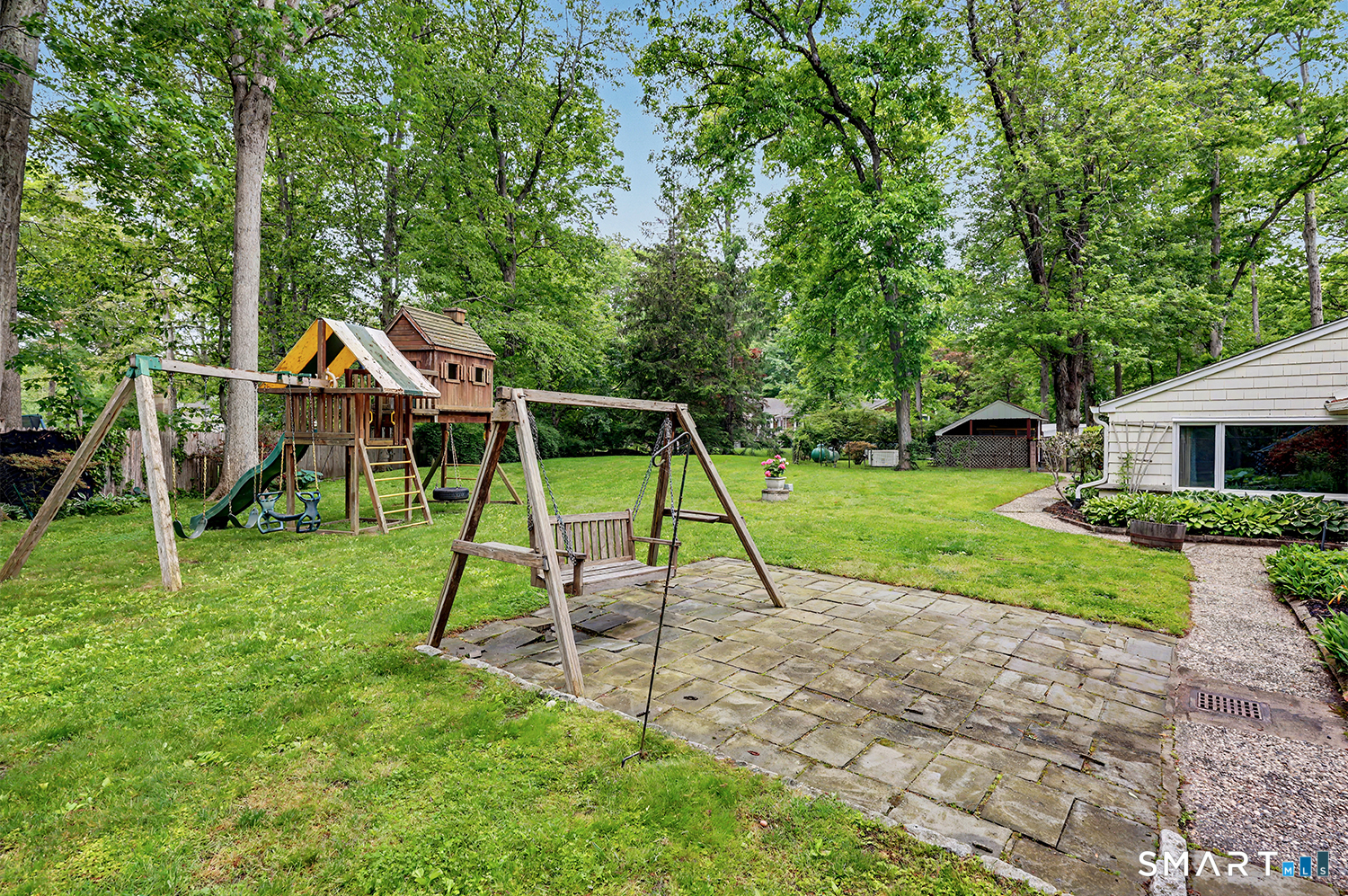 19 Geneva Road Norwalk, CT 06850 - Photo 5 of 33 a view of house with a backyard