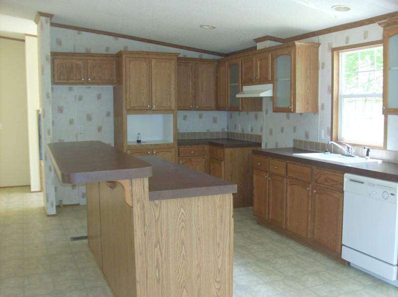 108 Westgrove Road Blue Ridge, VA 24064 - Photo 5 of 24 a kitchen that has a sink and a stove in it