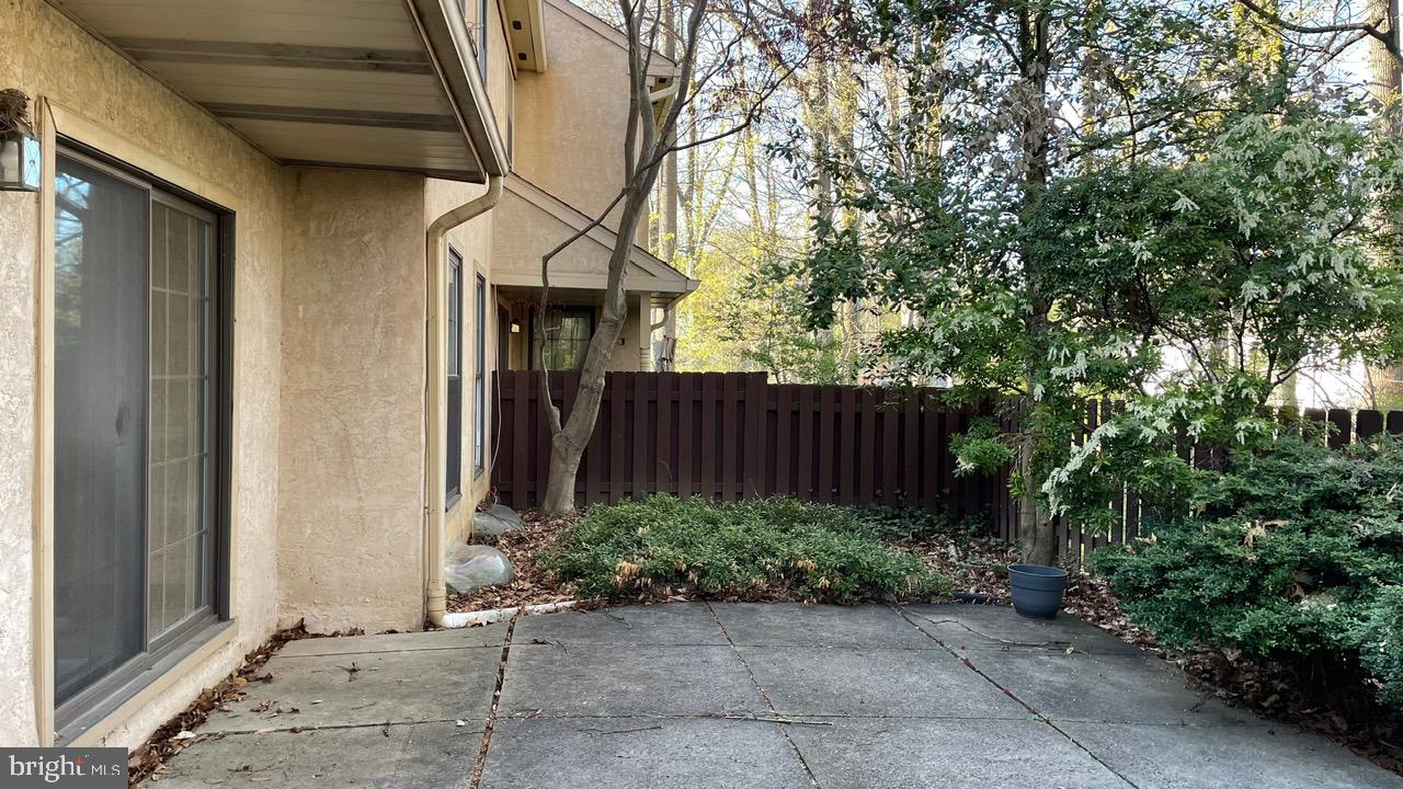 Back Patio with Wood Fence