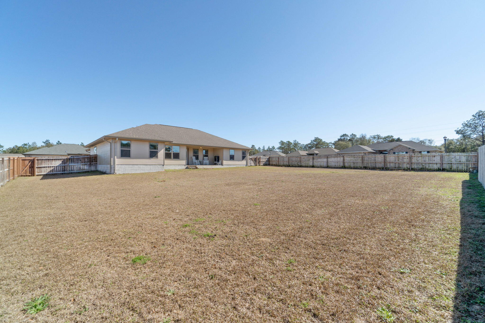 3633 Ranch Drive Crestview, FL 32539 - Photo 12 of 13 a house view with lake