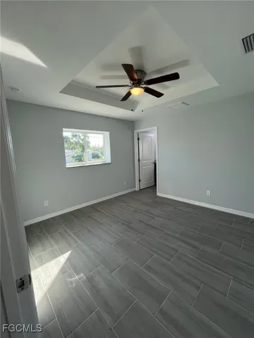 a bathroom with a sink toilet and mirror