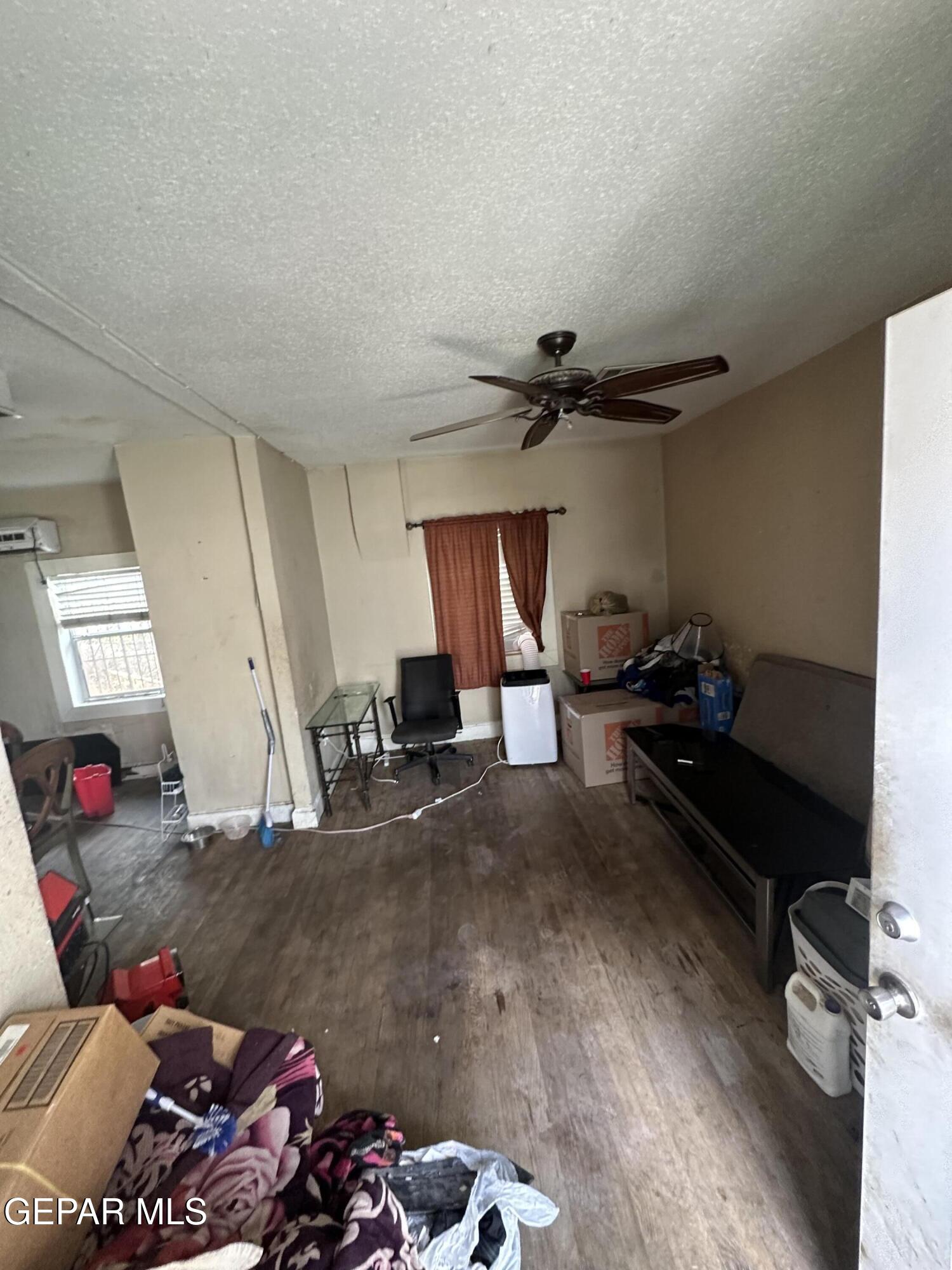 114 Fern Way El Paso, TX 79902 - Photo 4 of 9 a living room with furniture and a window