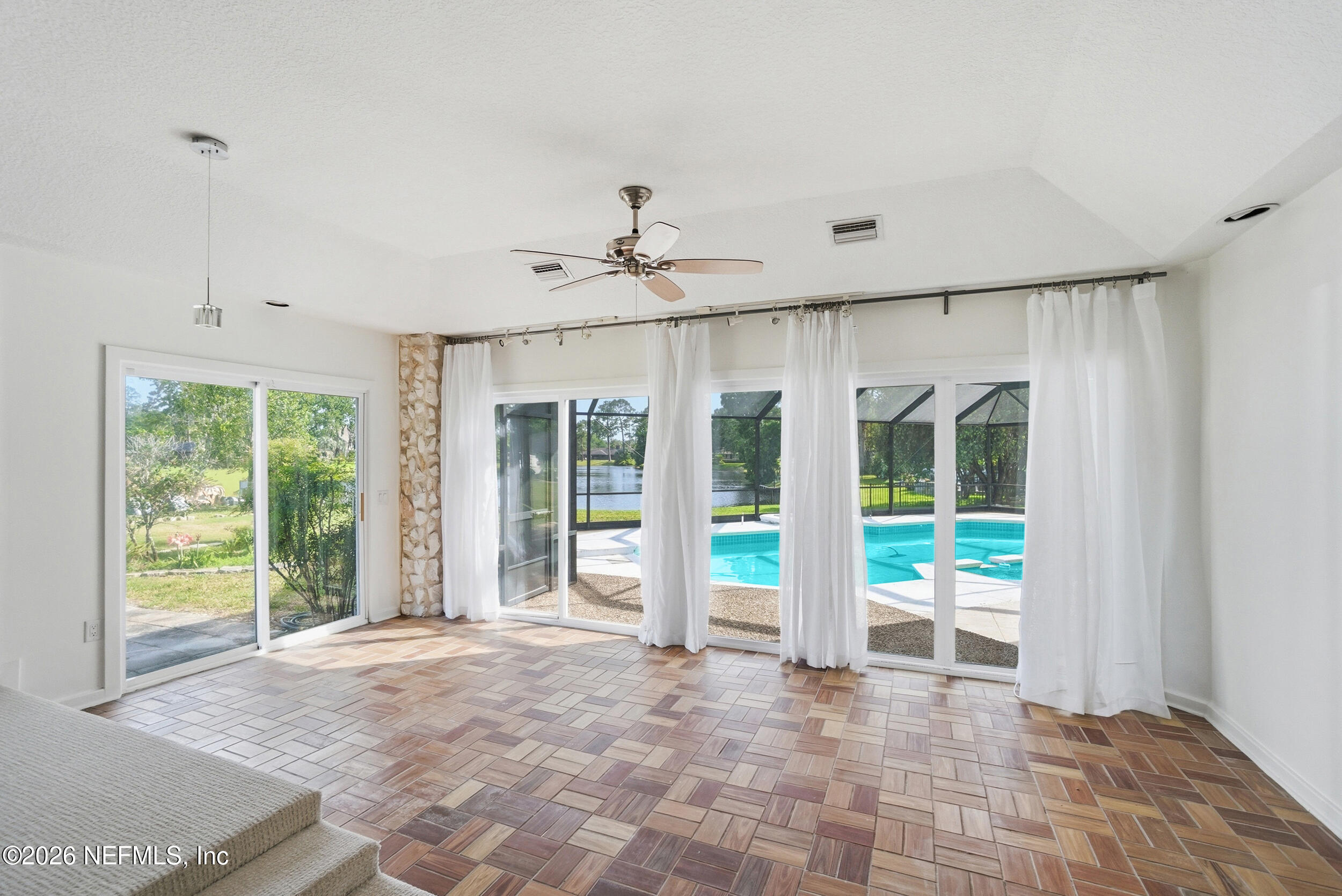 7911 Hunters Grove Road Jacksonville, FL 32256 - Photo 33 of 64 Staged Sitting area off Primary Suite