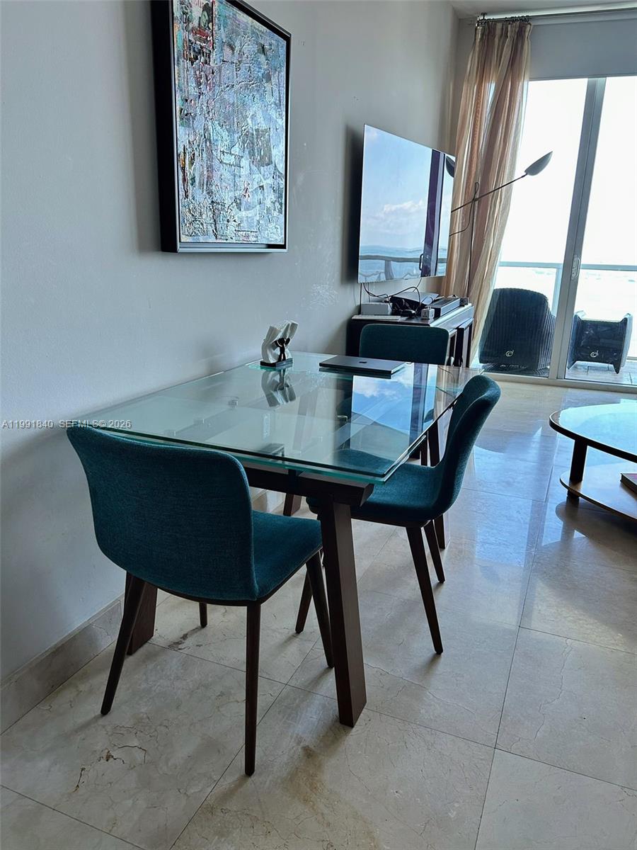 218 Southeast 14th Street, Unit TS303 Miami, FL 33131 - Photo 14 of 16 a view of a workspace with furniture