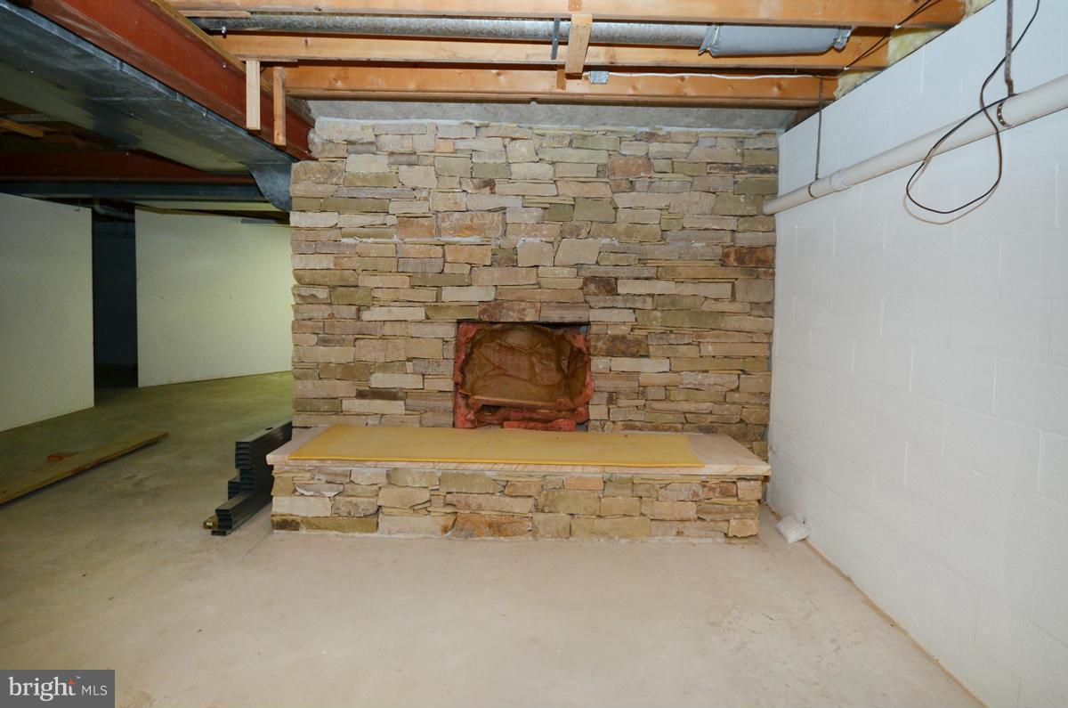 1716 Parsonage Road Parkton, MD 21120 - Photo 28 of 30 Lower Level Brick Fireplace